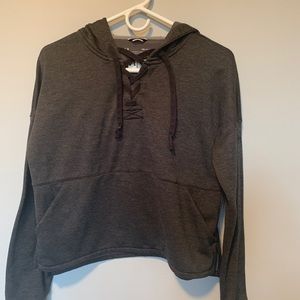 Under armour slightly cropped sweatshirt.